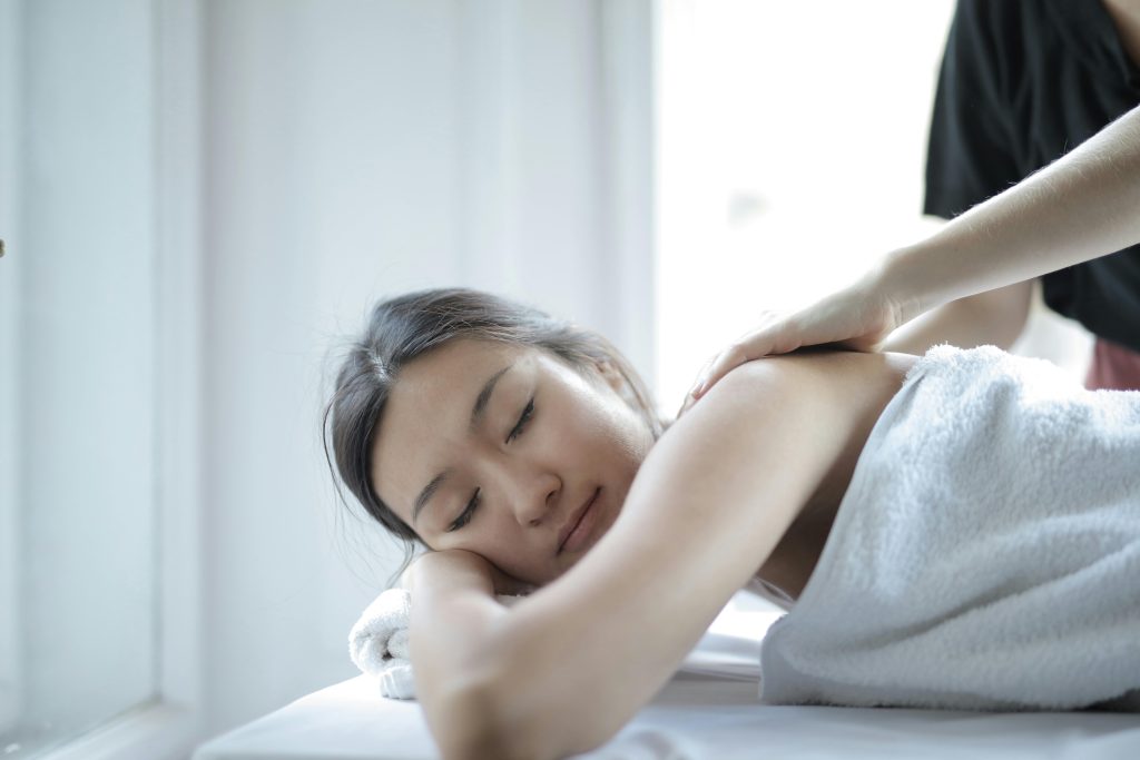 pexels-photo-3760262-3760262 Asian woman enjoying a relaxing body massage at a spa to unwind and rejuvenate.